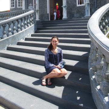 Natalie sitting on steps